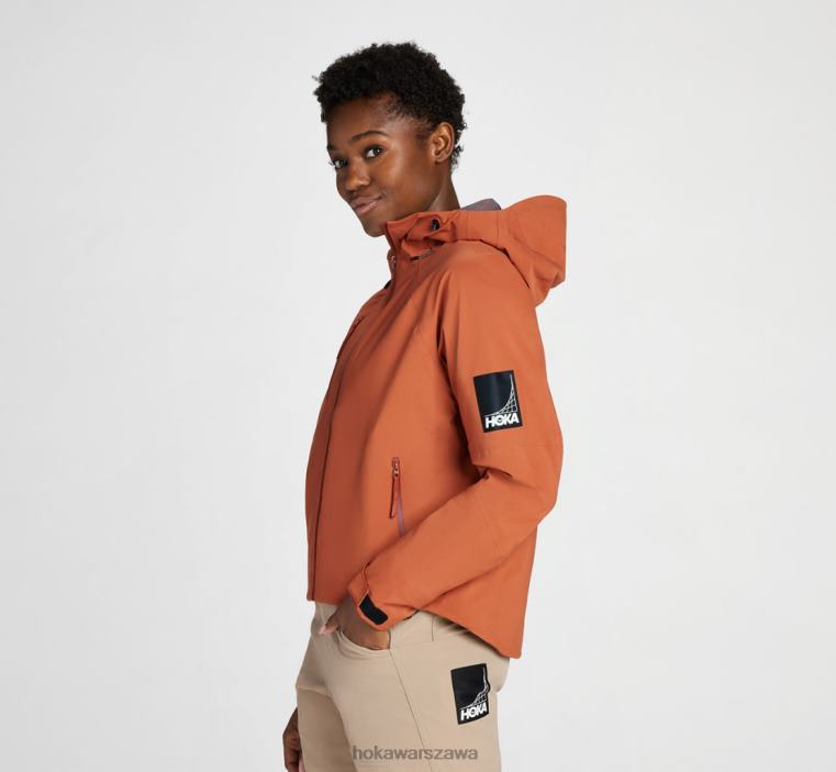 transportową kurtkę przeciwdeszczową Hoka L0PVV373 kobiety pieczona glina